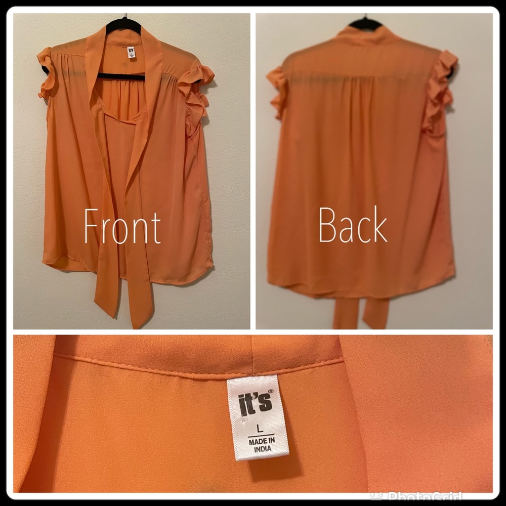 It’s a Orange/peach color blouse. Great for spring time. It’s in good condition.